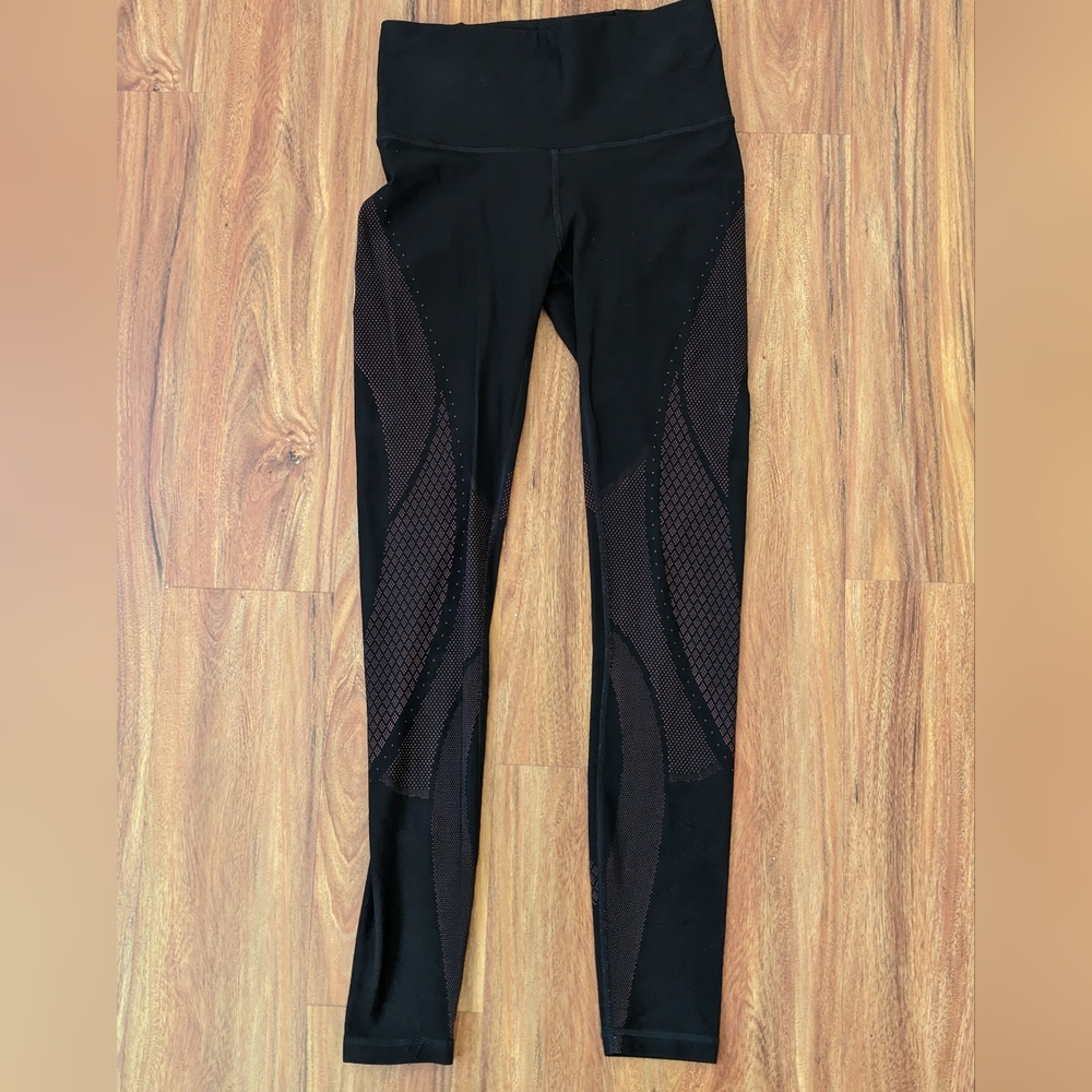 Lululemon Athletica Leggings - size 6 - Black with orange accent - like new
